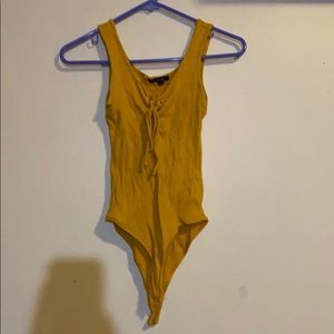 Yellow bodysuit
